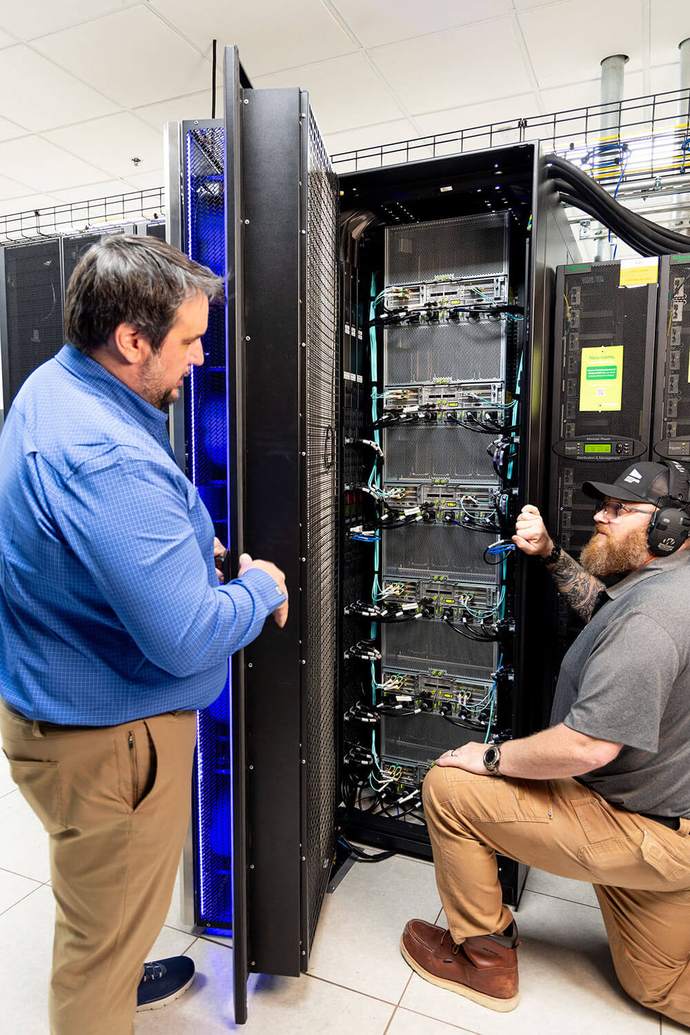 Scott Data Staff maintaining cabinets
