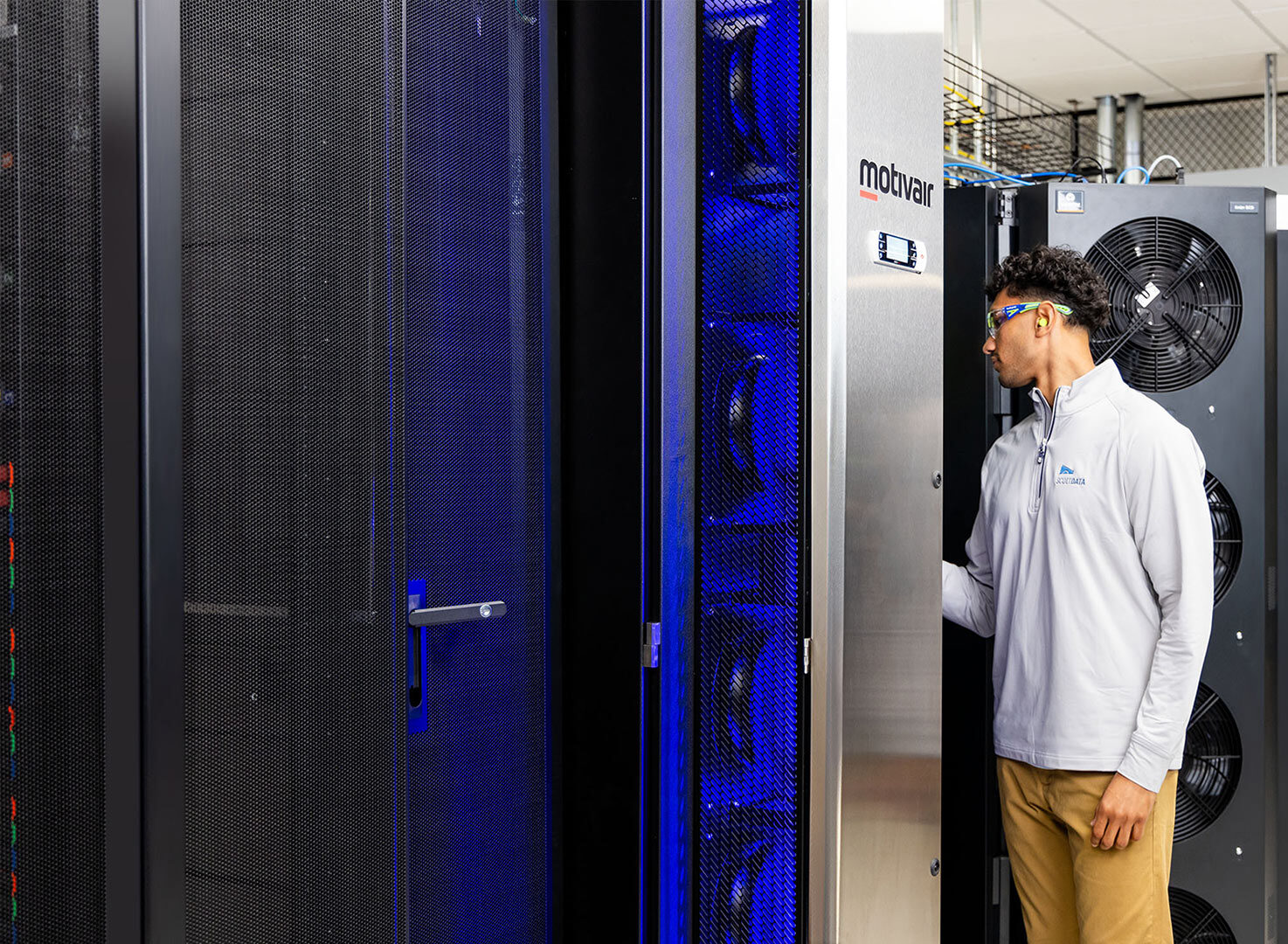 Scott Data employee working on Motivair equipment